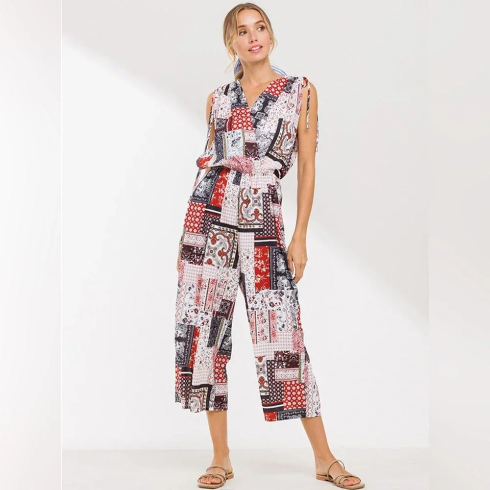 D231 Women’s Sleeveless V-Neck Surplice Multi Print Jumpsuit with Pockets